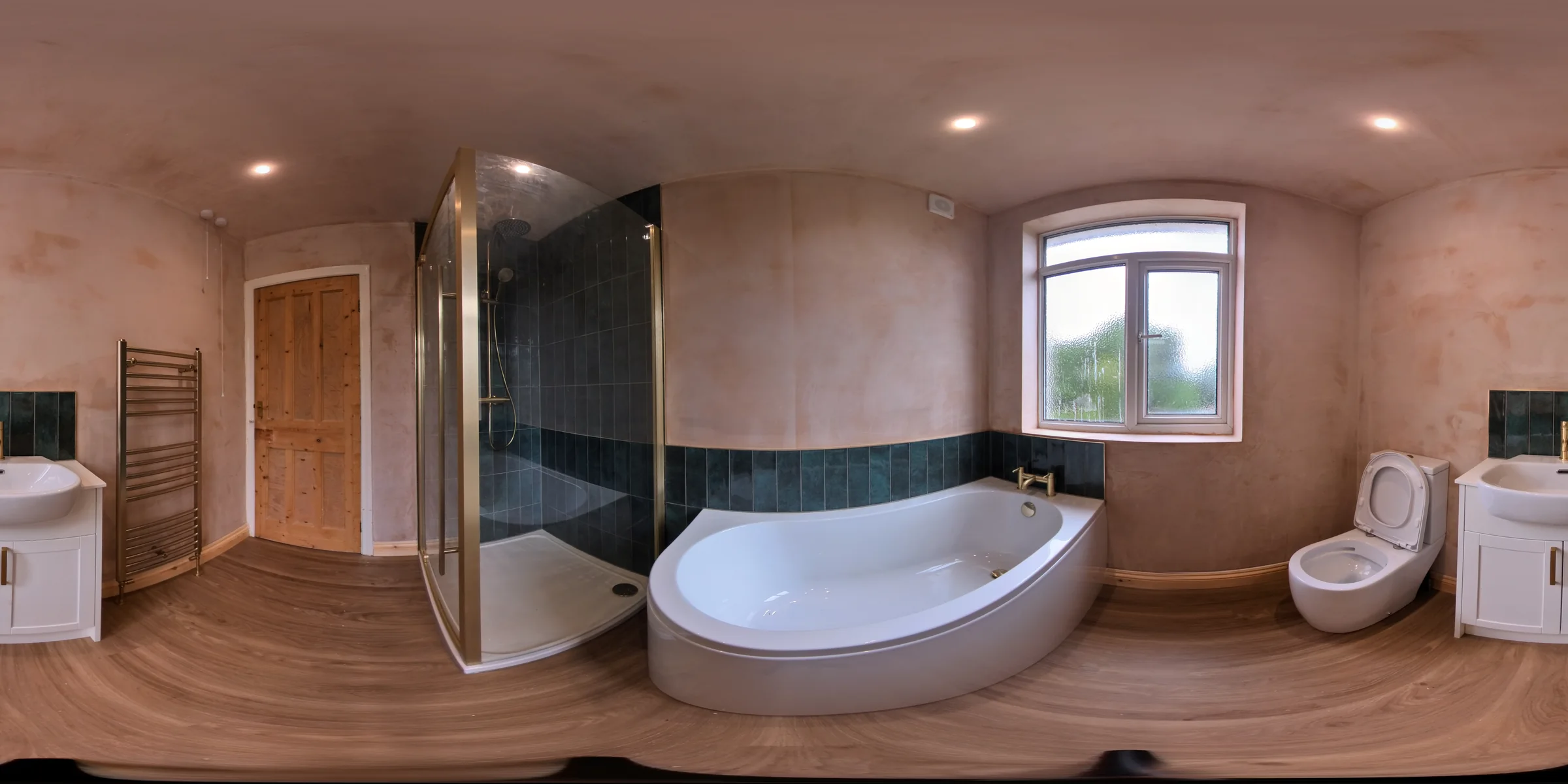 Green tiled bathroom with corner bath and shower